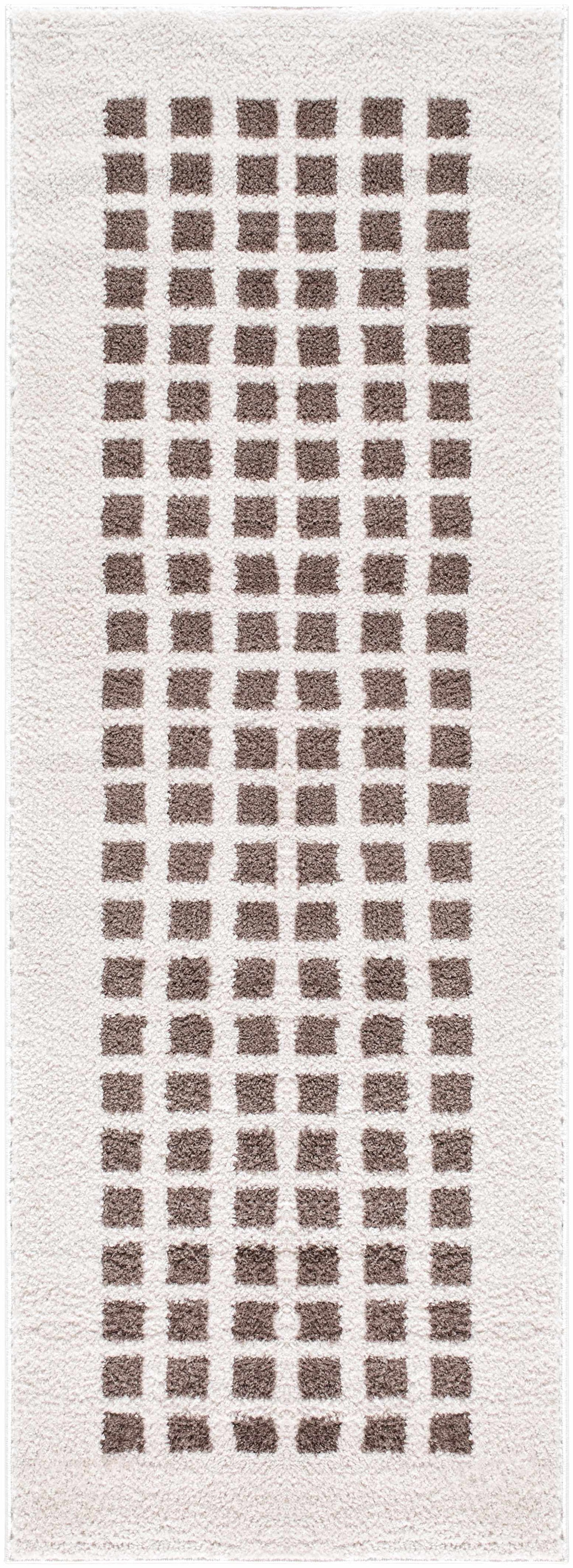 Close-up of a Baback Brown Washable Area Rug. The rug features a geometric pattern of brown rectangles on a cream background. Design-Runner-2773