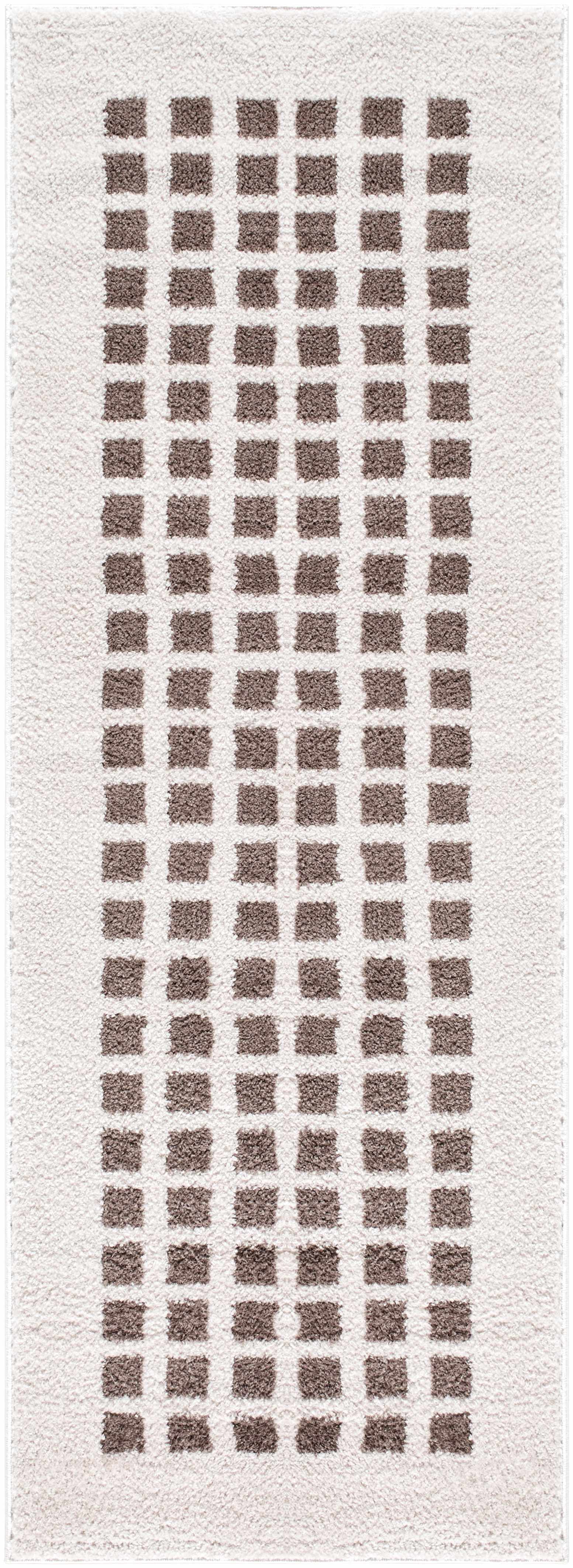 Close-up of a Baback Brown Washable Area Rug. The rug features a geometric pattern of brown rectangles on a cream background. Design-Runner-2773