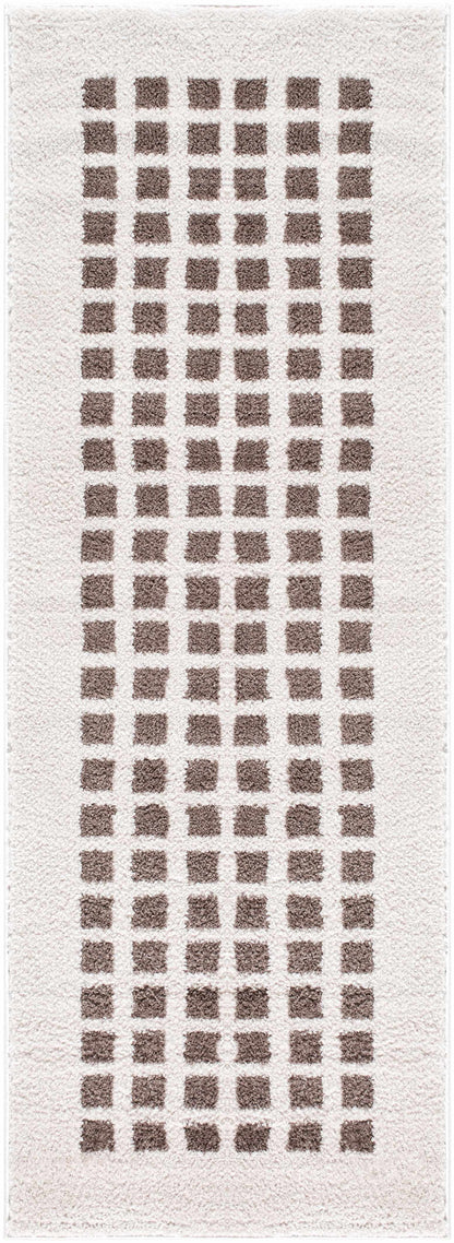 Close-up of a Baback Brown Washable Area Rug. The rug features a geometric pattern of brown rectangles on a cream background. Design-Runner-2773