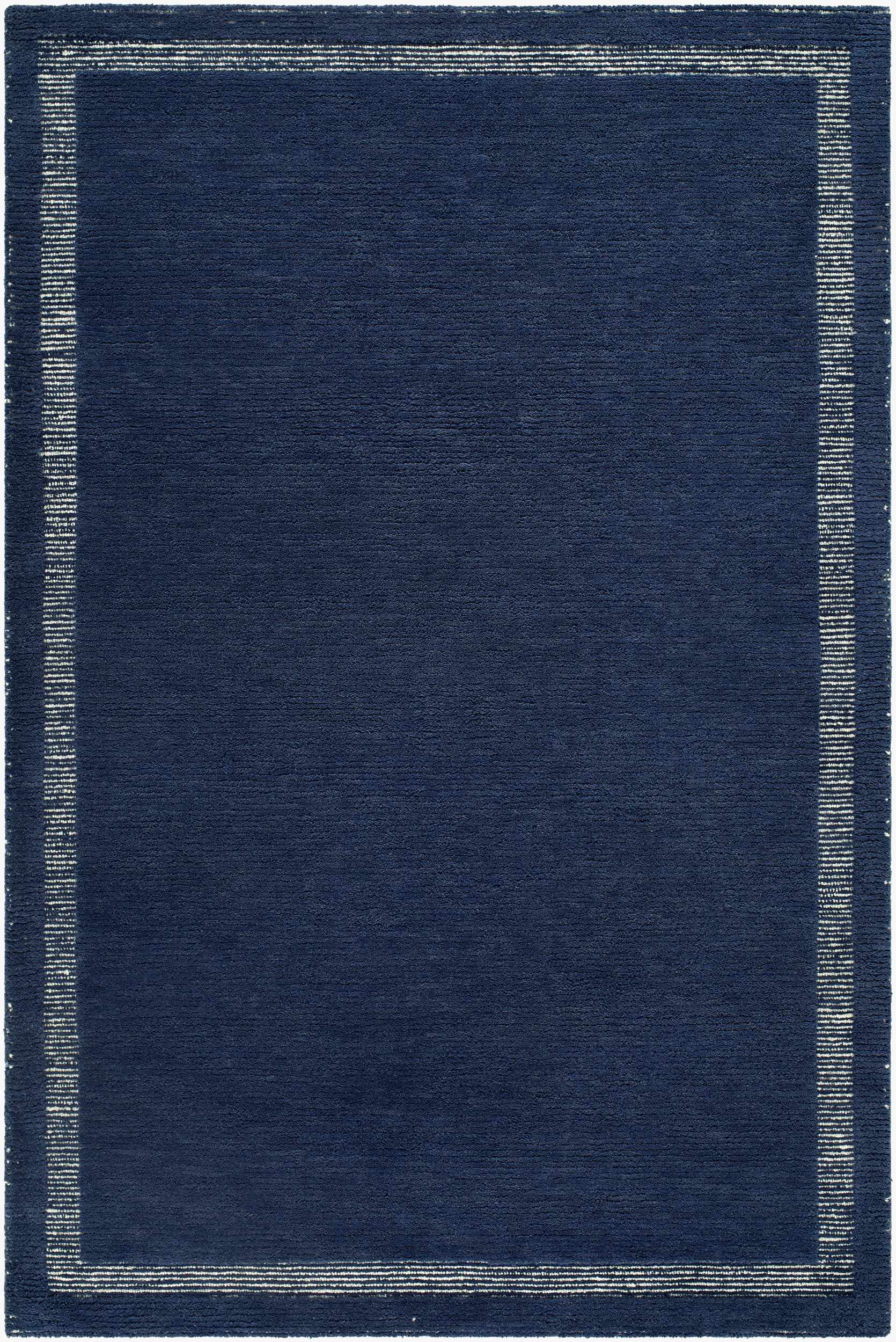 Close-up of the Tufape Modern Minimalist Handmade Area Rug; rectangle shape, slate gray wool with thin purple border. Design-Rectangle-576