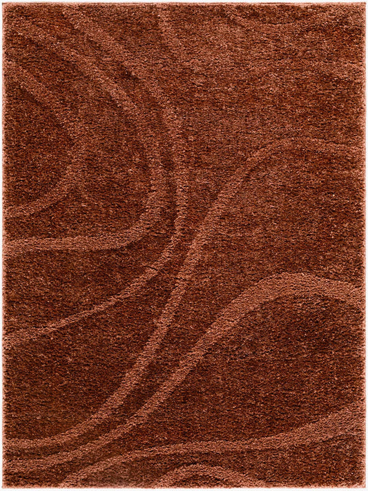 Close-up of the Horst Area Rug in rust, featuring a plush pile and subtle, swirling contemporary pattern. Design-Rectangle-537